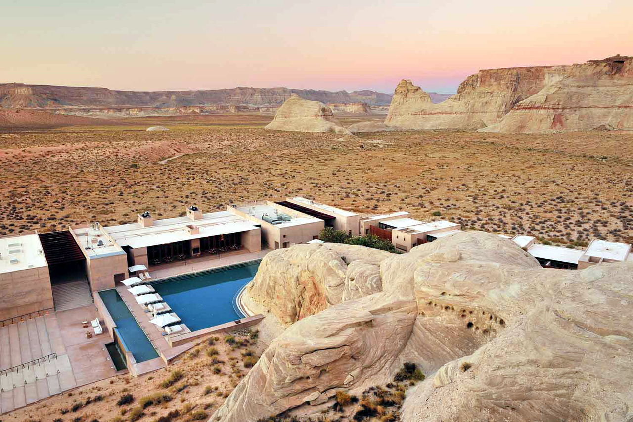 Set on 600 acres in Canyon Point and built into the landscape, this all