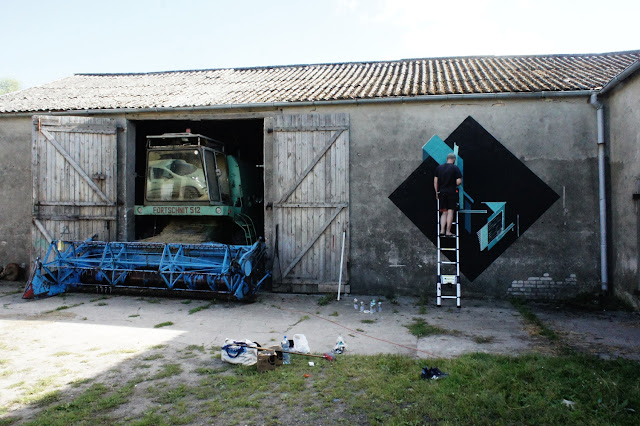 Street Artist Seikon At Work on a new mural in parchowo