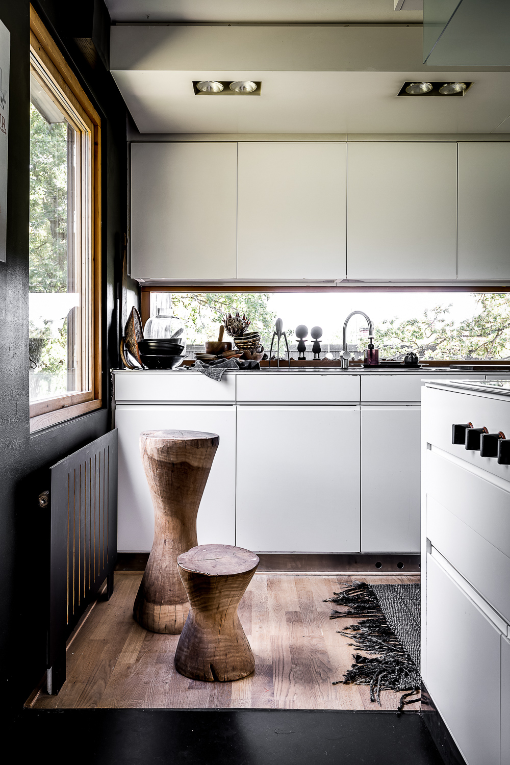 Kitchen in minimalist villa in white and gray with a simple decor