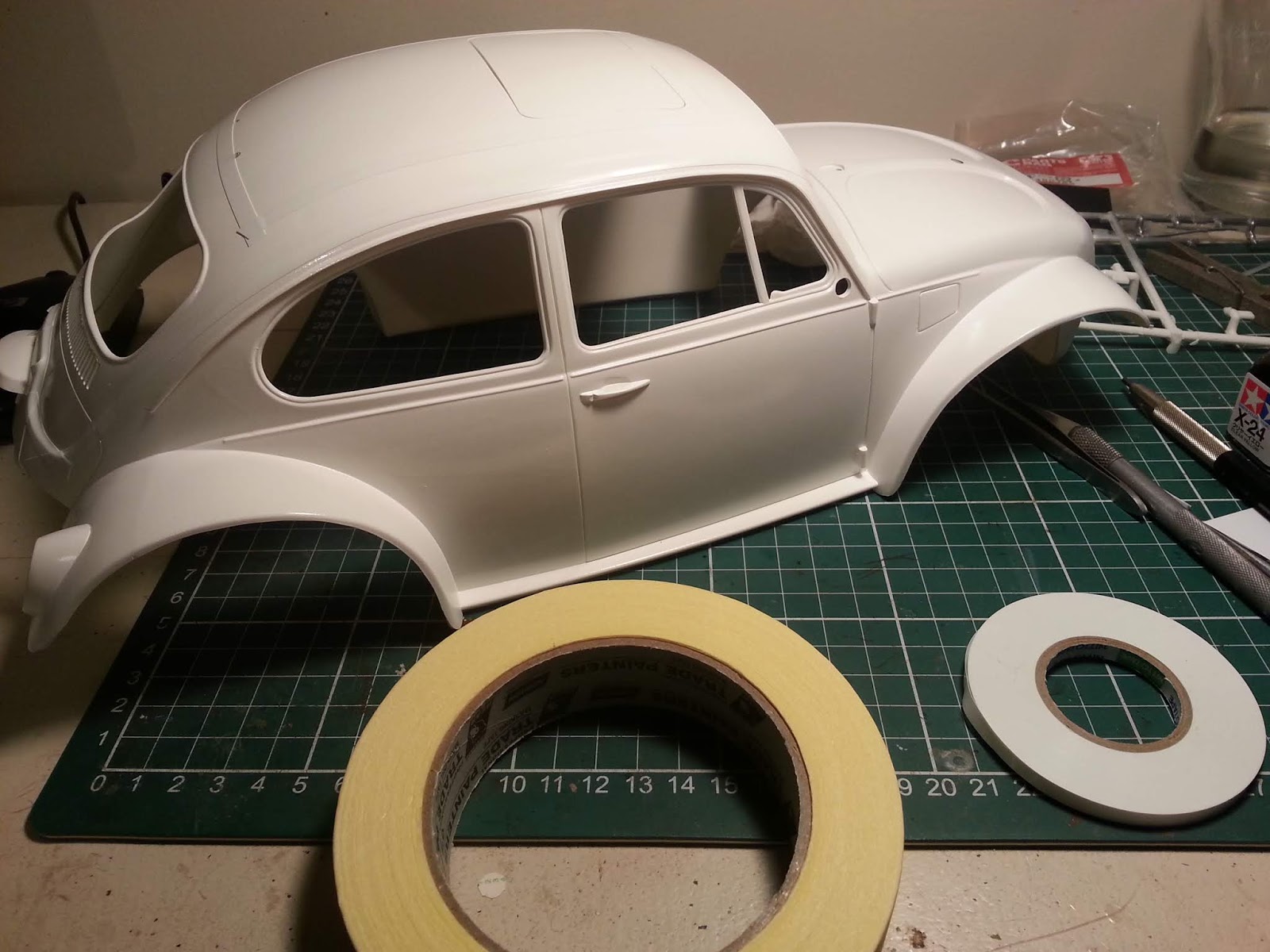 Dave's Model Masking the Sand Scorcher for painting