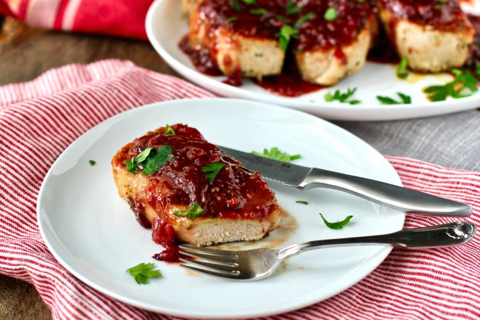 Pan seared pork chops with cranberry maple sauce