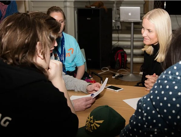 Crown Princess Mette Marit wore CHLOÉ Fringed jacquard jacket and Prada suede pumps at Amandus International Student Film Festival for Young Filmmakers