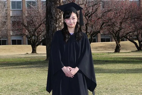 The younger daughter of Prince and Princess Akishino wore a black gown and mortarboard for the graduation ceremony
