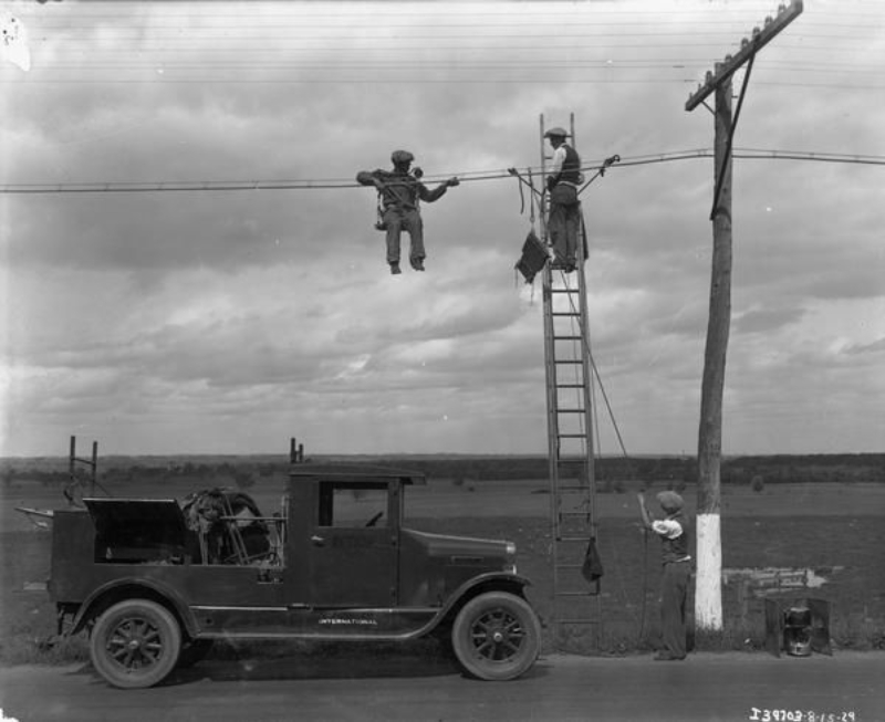 Telephone line repairmen at work, 1929 vintage everyday