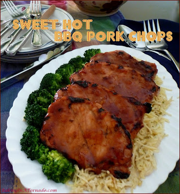 Marinate, grill and dinner is done. Sweet Hot BBQ Pork Chops feature a little sweet and a little heat in this 3 ingredient marinade. | Recipe developed by www.BakingInATornado.com | #recipe #dinner