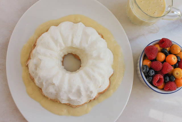 Food Lust People Love: A fun and easy twist on the original French dessert called îles flottantes, this floating island Bundt features meringue baked in a Bundt pan, served with fresh fruit and crème anglais, a pourable vanilla custard.