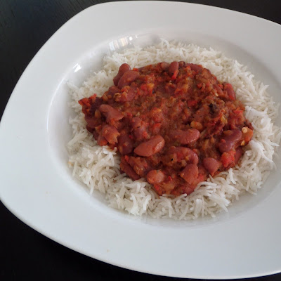 Red Beans and Rice:  A one dish meal of red kidney beans flavored with bacon and peppers served over rice.