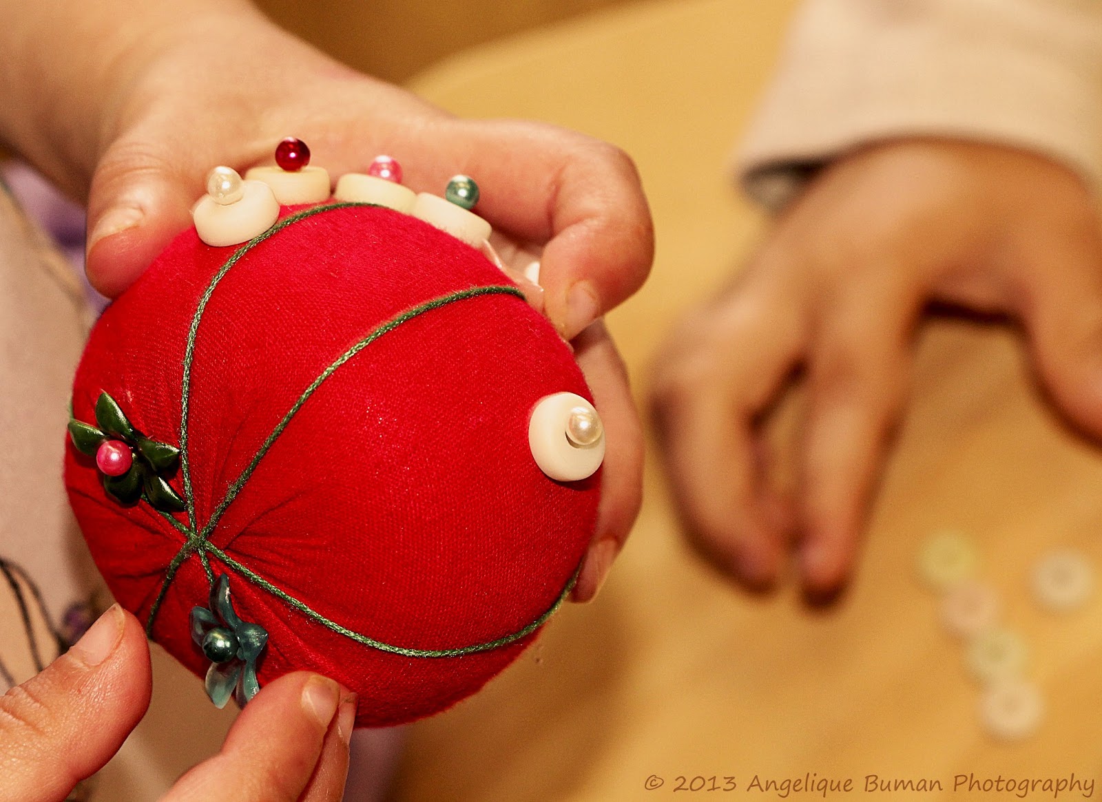 Creative Education with Angelique Pushing Pins into a Pin Cushion Activity