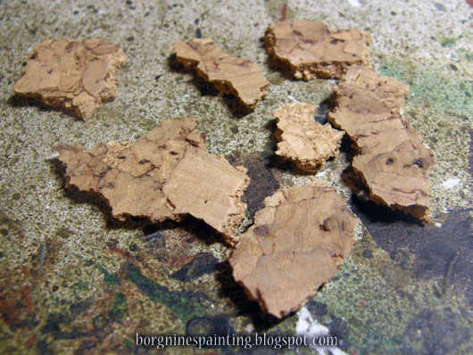 Photo showing numerous torn pieces of flat cork to illustrate what's needed in the next step.