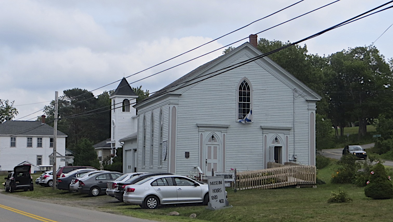 Standing Into Danger Hooking Rugs in Smith's Cove, Nova Scotia, Canada