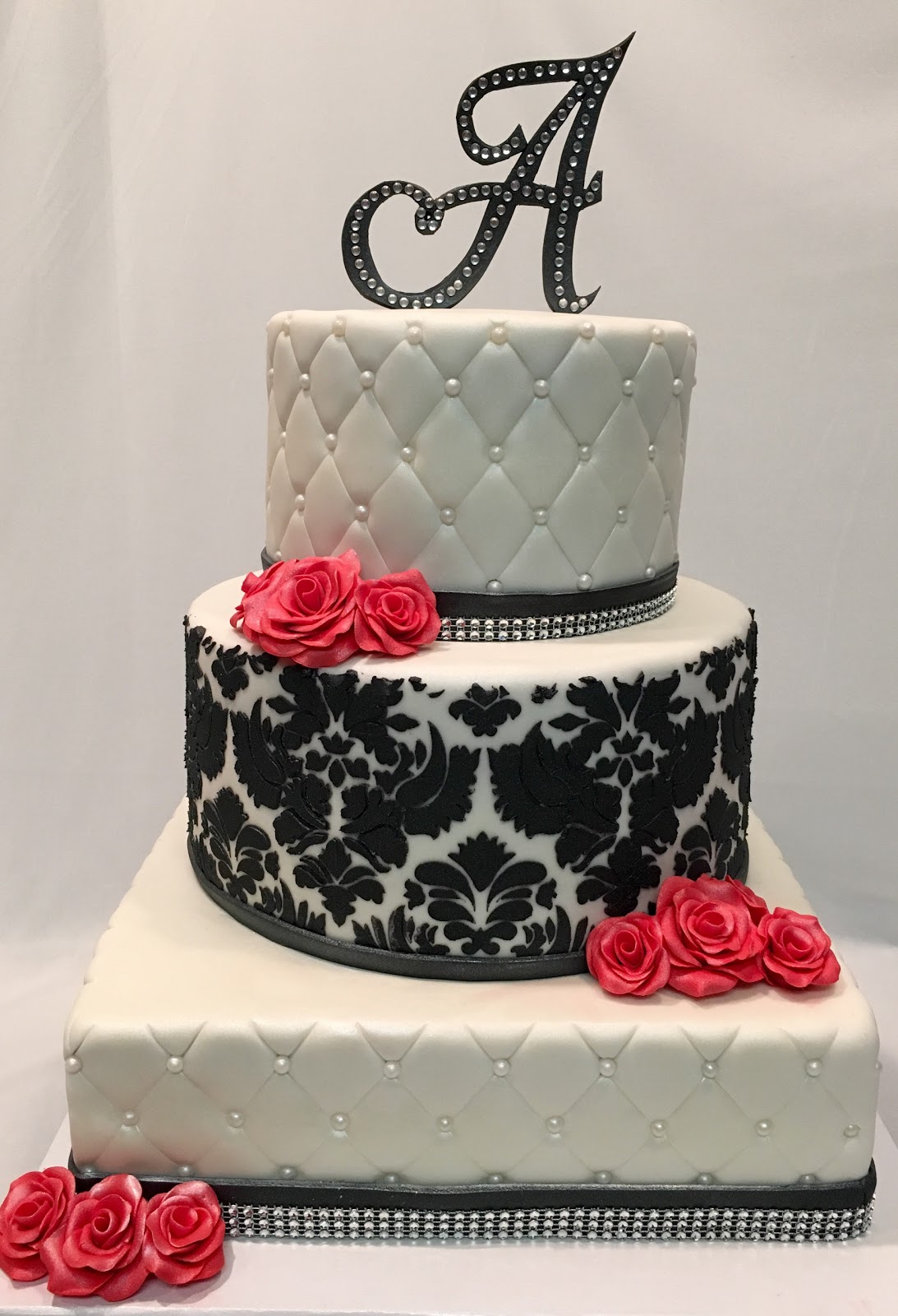 MyMoniCakes 3 tiered quilted pattern and damask cake with fondant roses