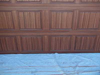 garage door painted to look like wood