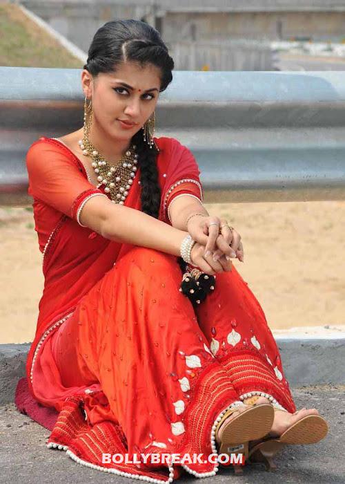 Tapsee in red saree sitting on road - Tapsee in Red Saree Sitting on Road 