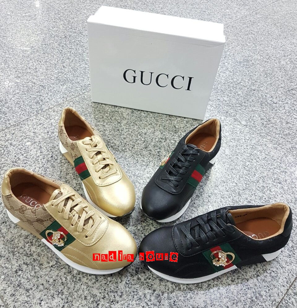 Nadira House Sepatu GUCCI kode YC33336 hitam dan gold