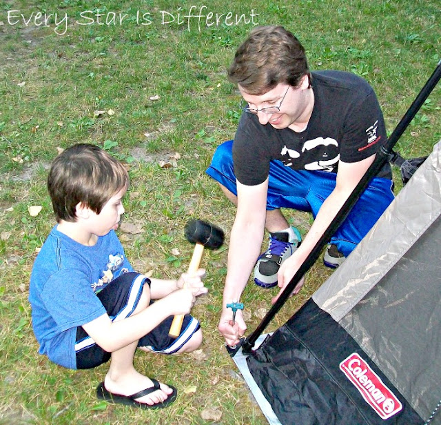 Setting Up the Tent: Hammering in the Stakes