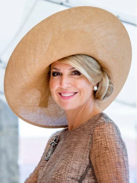 Queen Maxima wore a new Natan dress. Lisbon mayor Fernando Medina. President Marcelo Rebelo de Sousa