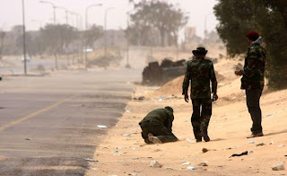 Libya NTC's rebels laying landmines