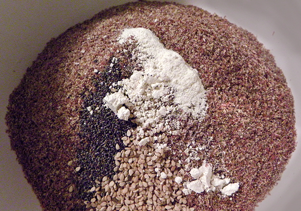 Bowl of flaxseed, sesame seed, poppy seed, and spices