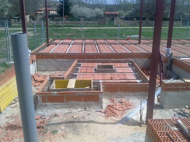 Silo de obra de pellet enterrado en cimientos - Ecocalderas