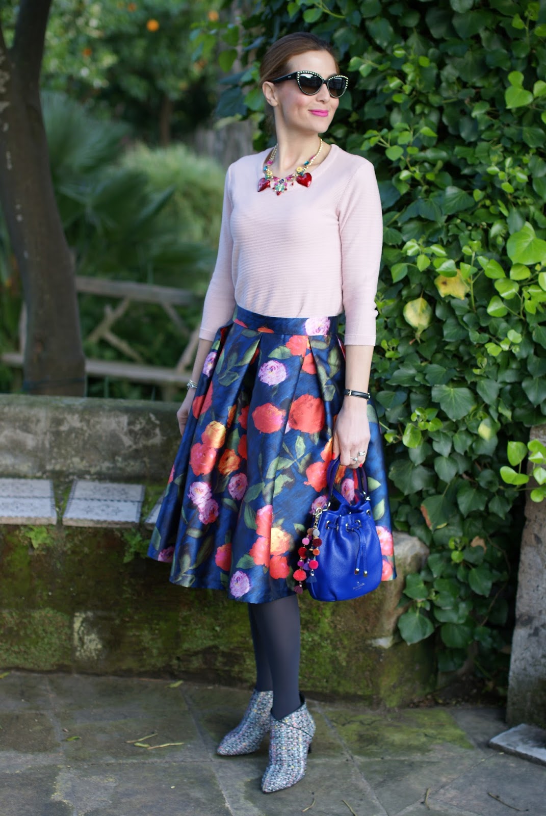 How to wear a midi skirt in Spring: floral midi skirt, tweed ankle boots, jeweled hair pin on Fashion and Cookies fashion blog, fashion blogger style