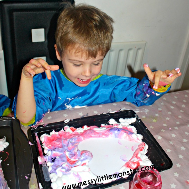 Easy kids marbled heart craft using shaving foam. A fun art and sensory heart activity for toddlers and preschoolers. Inspired by the story 'The day it Rained Hearts' and national reading month. 