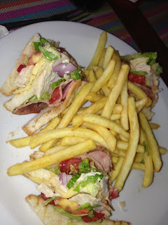 A club sandwich and fries in Kavos
