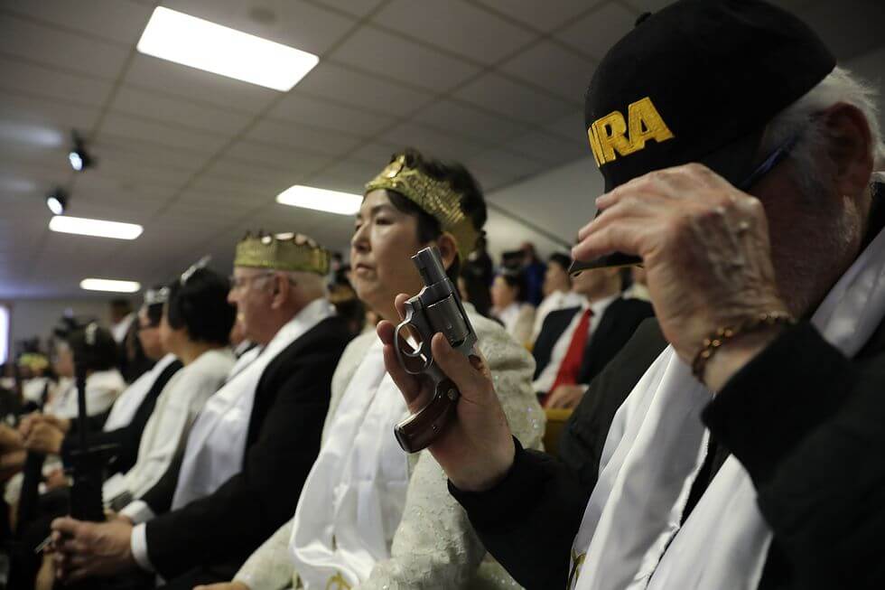 Pictures Of Gun 'Commitment Ceremony' Horrify The US