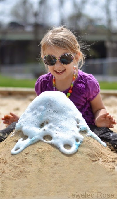 Making a sand volcano is tons of fun for kids!  You can easily set this activity up at the beach or right in your sand box.