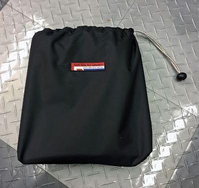 Tonneau packs easily into this supplied bag Tonneau packs easily into this supplied bag