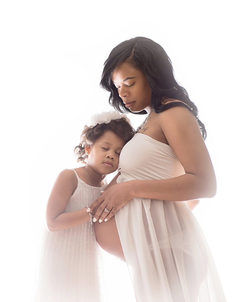 African American Maternity Photos in studio with dream lighting DeKalb Sycamore IL photographer
