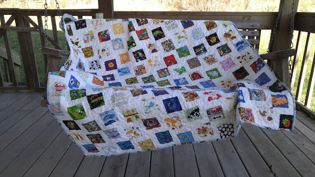 Disappearing nine patch I Spy quilt