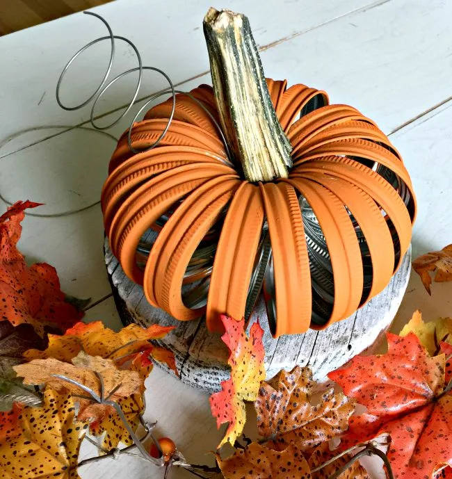 orange painted mason jar lid pumpkin