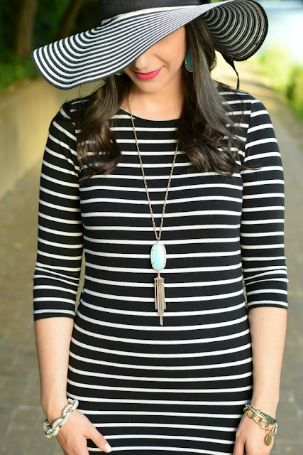 Striped hat and dress with Kendra Scott Rayne necklace
