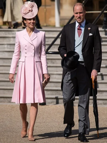 Kate Middleton wore a bespoke soft pink coatdress by Alexander McQueen. Loeffler Randall clutch. Countess of Wessex