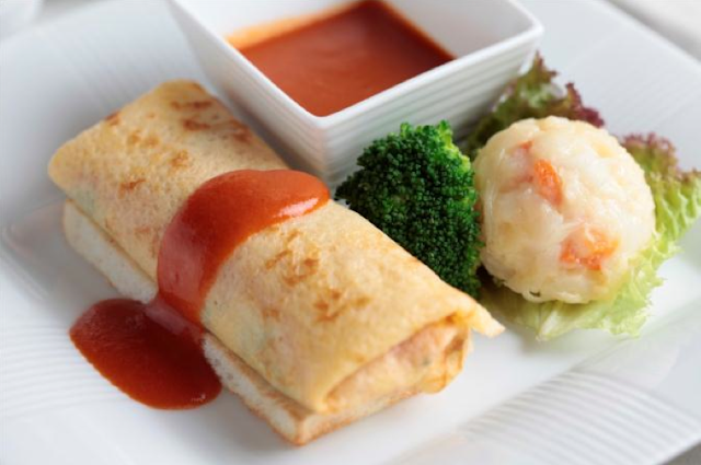Early December special breakfast menu: traditional style chicken and spinach omelet wrapped with egg crepe