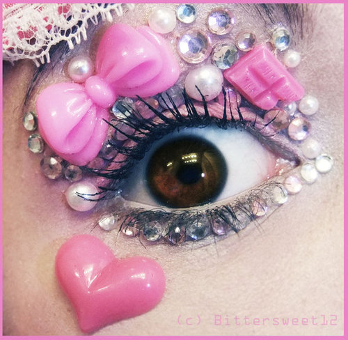 Beautiful Eyes Accented with Clear Stones and Pink Heart and Roses