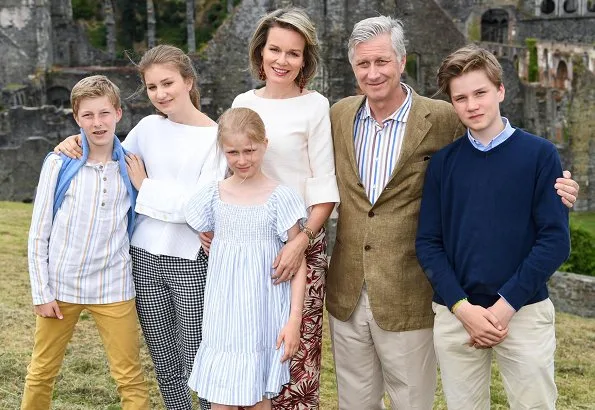 Queen Mathilde wore Dries Van Noten trousers, white bell Sleeve Stretch Crepe Top. Crown Princess Elisabeth and Princess Eleonore