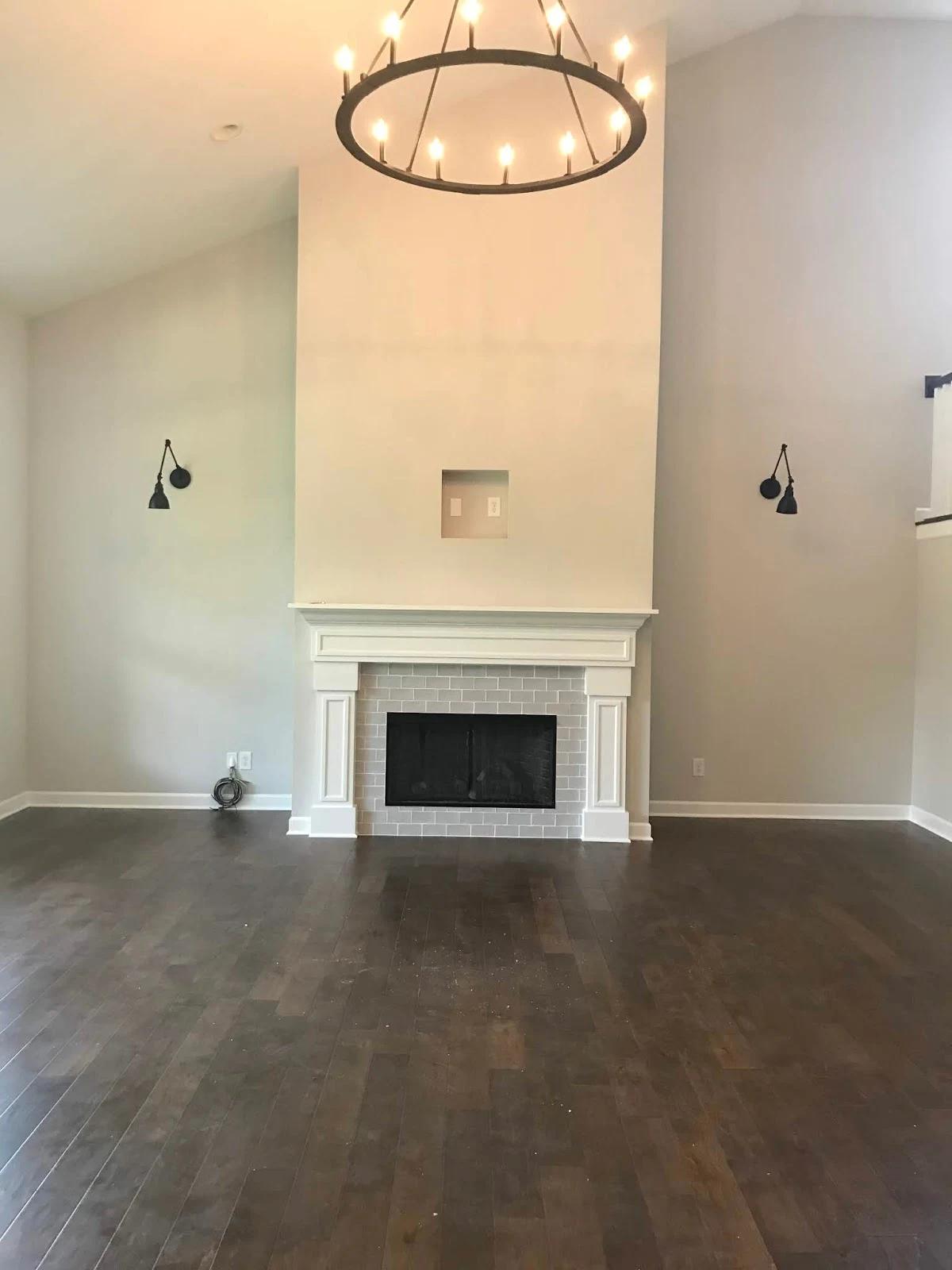 Tall fireplace with gray tile