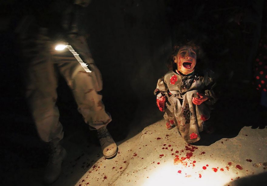 Top 100 Of The Most Influential Photos Of All Time - Iraqi Girl At Checkpoint, Chris Hondros, 2005