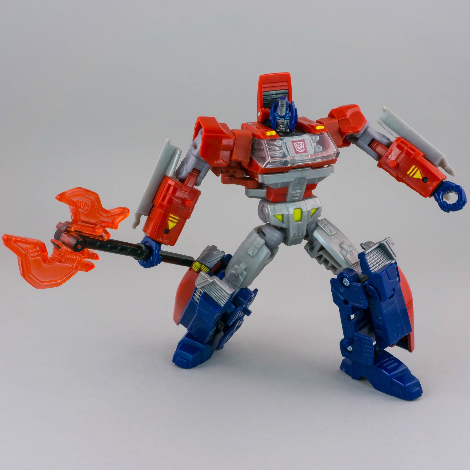 Transformers Generations Orion Pax robot mode posed with axe alternate pose