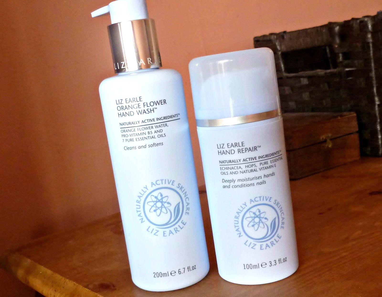 A picture of Liz Earle Orange Flower Hand Wash and  Liz Earle Hand Repair