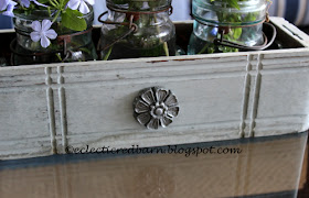 Sewing drawer with wooden flower attached