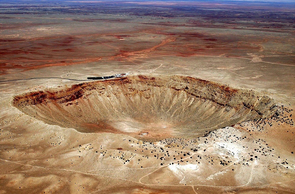 Самый крупный кратер на земле. Кратер Бэрринджера. Метеорит Чиксулуб. Метеоритный кратер Бэрринджера. Мульдайский метеоритный кратер.