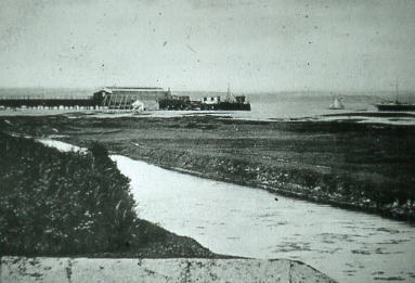 Stokes Bay Pier with HMS Iris