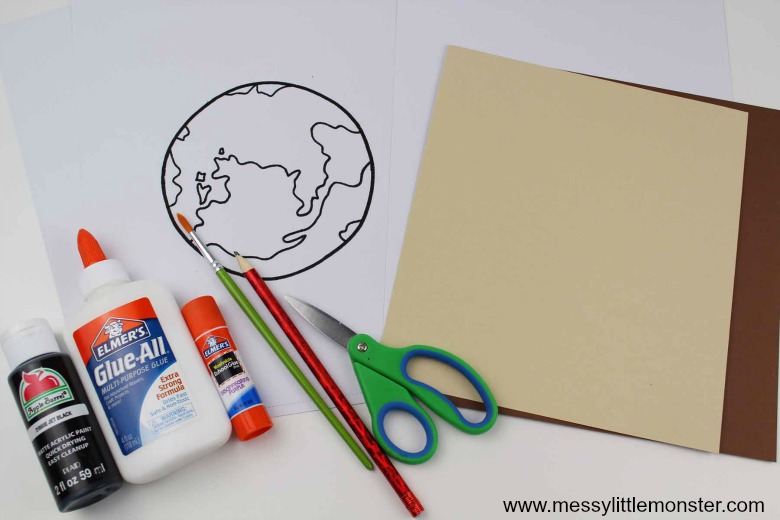 Black glue earth day craft - use the free earth printable template to make an easy planet earth craft for kids.