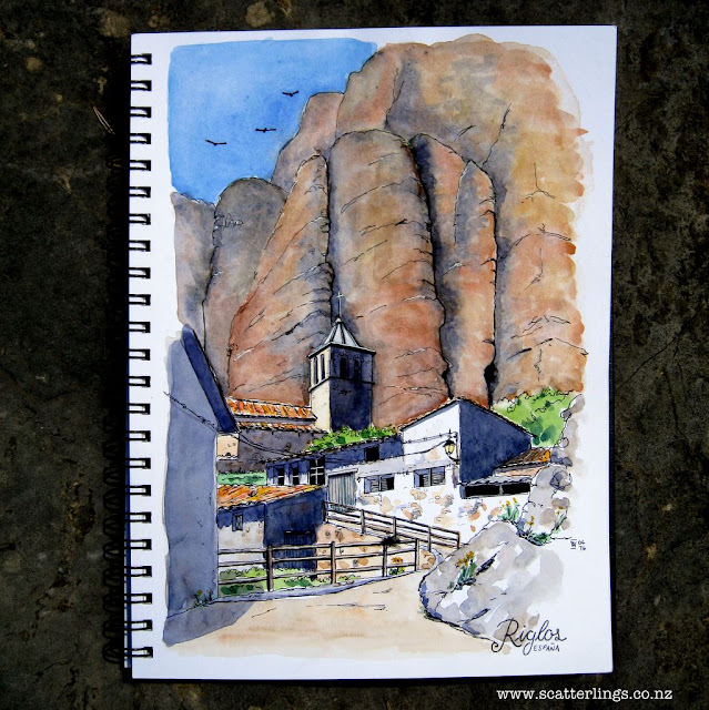 Riglos, watercolour painting of the church, town and conglomerate cliffs.