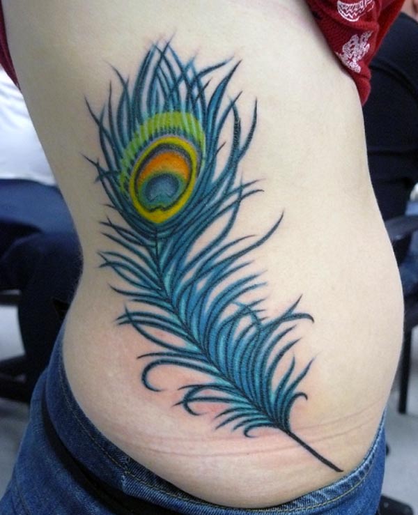 That peacock feather tattoo looks really so awesome that would make girl’s side piece really lovely look