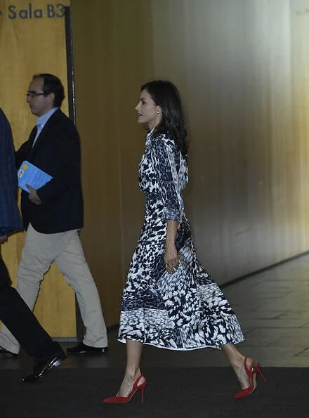 Queen Letizia wore a leopard-print silk blouse and midi skirt by Victoria Beckham. Crown Princess Leonor, Carolina Herrera