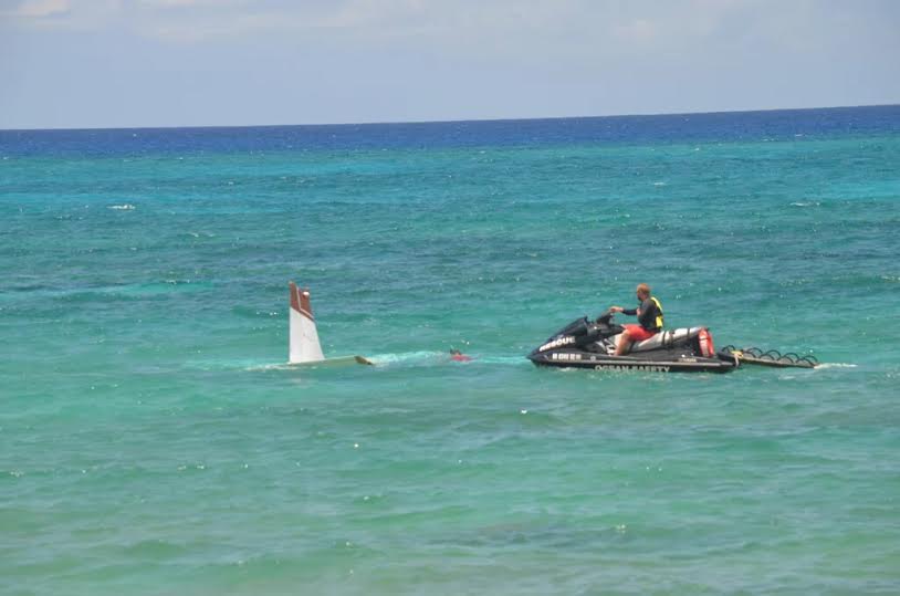 Photos Pilot & Passenger in a small plane survive after a crash into the ocean