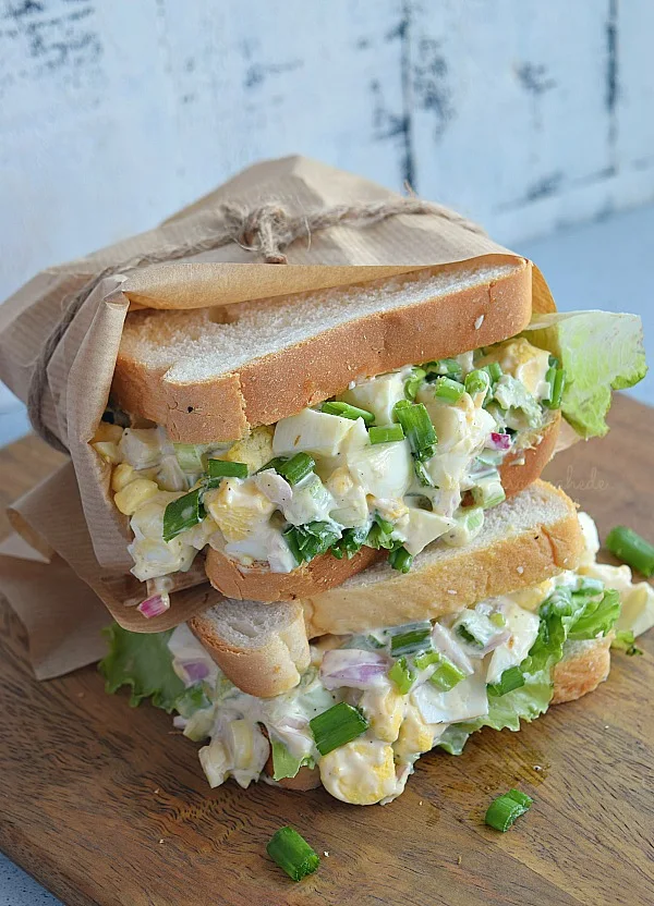 Egg Salad sandwich with lots of onion,green onion,sauce